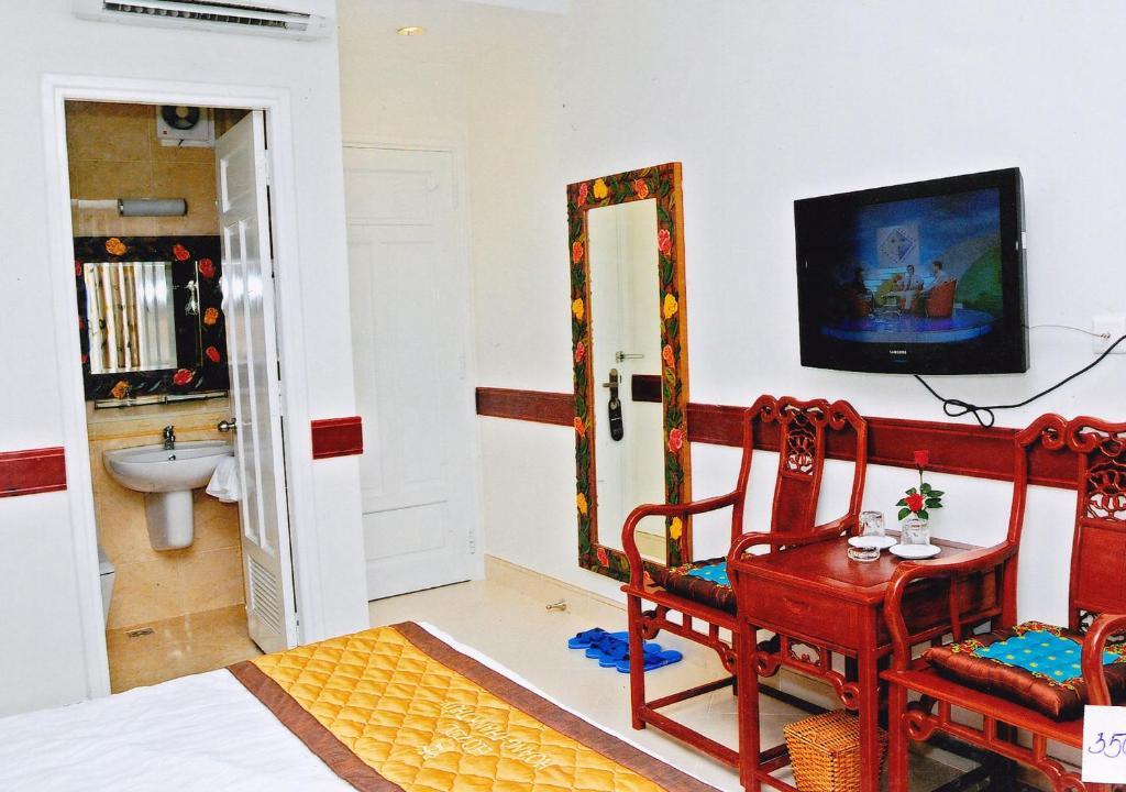 Hoang Thanh Thuy Airport Hotel 1 - Gan Am Thuc Dem Cho Hoang Hoa Tham Cidade de Ho Chi Minh Quarto foto